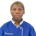 Portrait of a woman wearing a blue uniform with white trim and a beige head wrap, facing the camera.