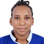 Head-and-shoulders portrait of a young woman with braided hair, wearing a blue uniform, against a white background.