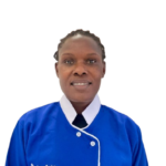 Portrait of a woman in a blue uniform with a white collar, facing the camera and smiling.