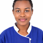 Front-facing portrait of a person with braided hair wearing a blue medical uniform with white trim against a white background.