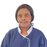 Portrait of a woman in a navy uniform with white piping and the 'Excellence Center' logo on the chest against a white background
